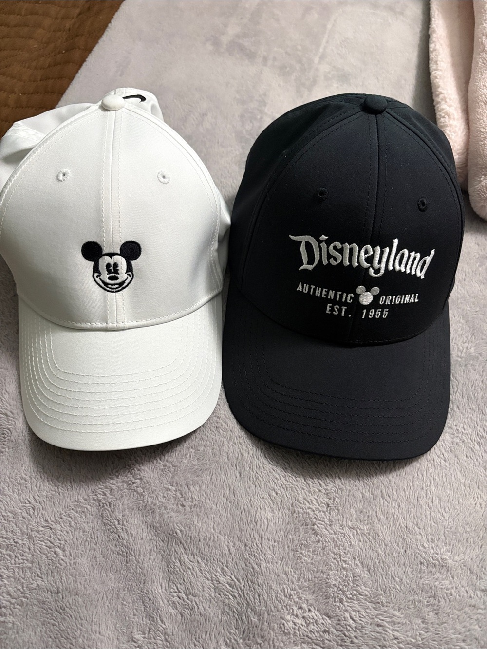 TWO Disneyland Dri-fit hats